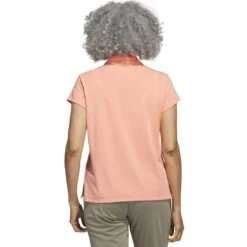 Adidas 2023 Women's Go-To Heathered Polo -Golf Equipment Store adidas 23 womens go to heathered polo coral fusion back itempicture
